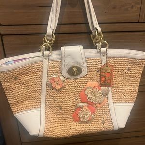 Coach *like new* leather/ raffia shoulder bag with metallic flowers.